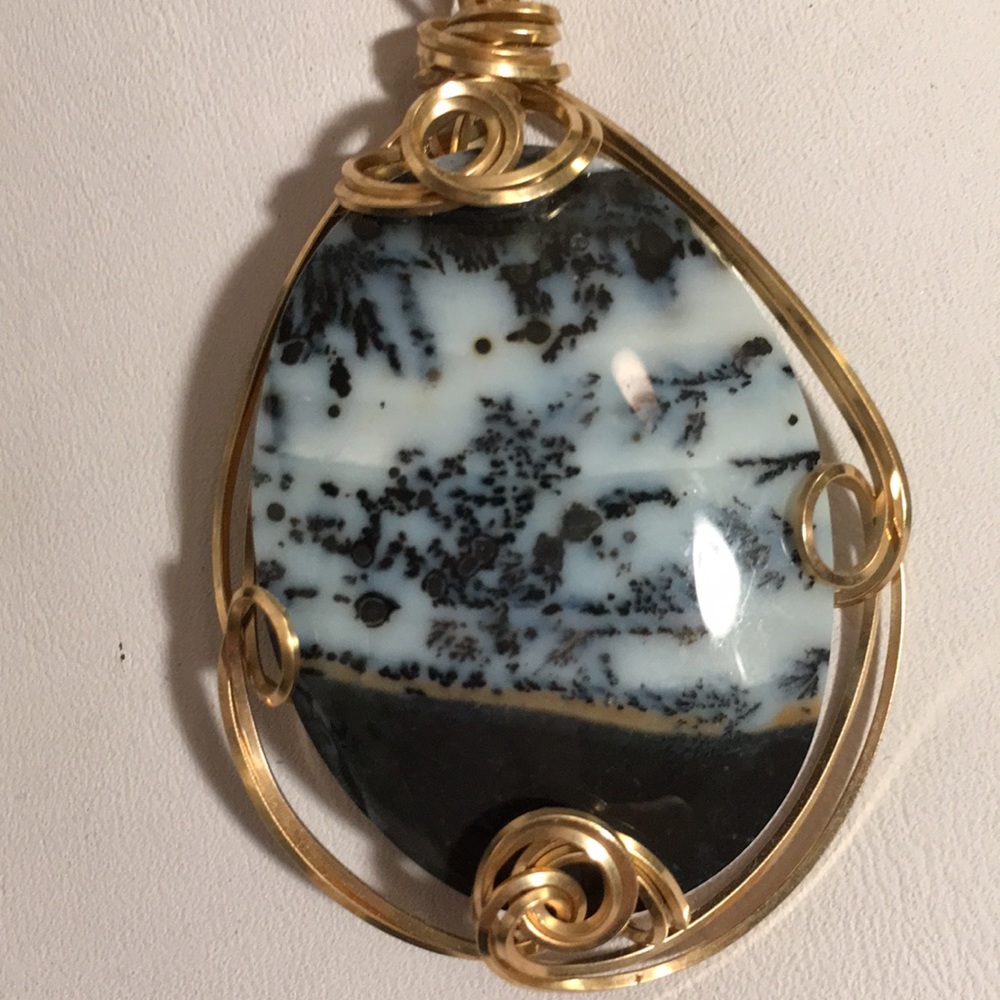 14 karat gold wired polished stone